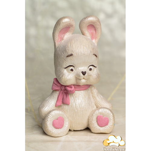 Шоколадна статуетка перламутрова "Зайченя" з рожевим бантиком Шоколадна статуетка перламутрова "Зайченя" з рожевим бантиком