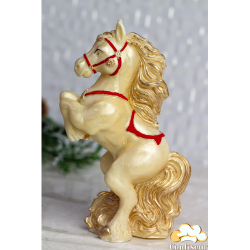 Шоколадна статуетка золота "Кінь" з золотою гривою Шоколадна статуетка золота "Кінь" з золотою гривою
