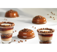 The decor of the Milk chocolate Crispearls ™ Milk