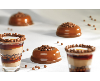 The decor of the Milk chocolate Crispearls ™ Milk (0.8 kg)